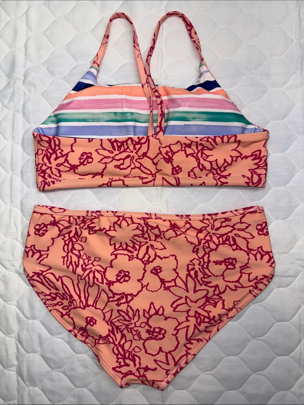 This Athleta Girl reversible bikini set high neck top and mid-rise bottoms